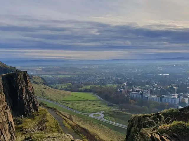 Salisbury Crags and the view over Edinburgh from Arthur&rsquo;s Seat