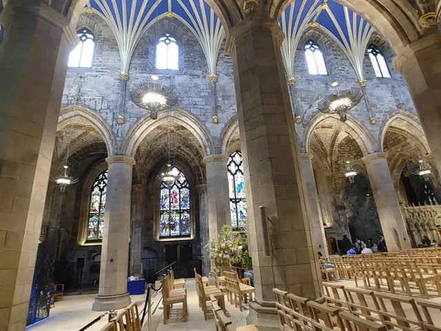 The vaulted nave and stained glass inside St Giles&rsquo; Cathedral