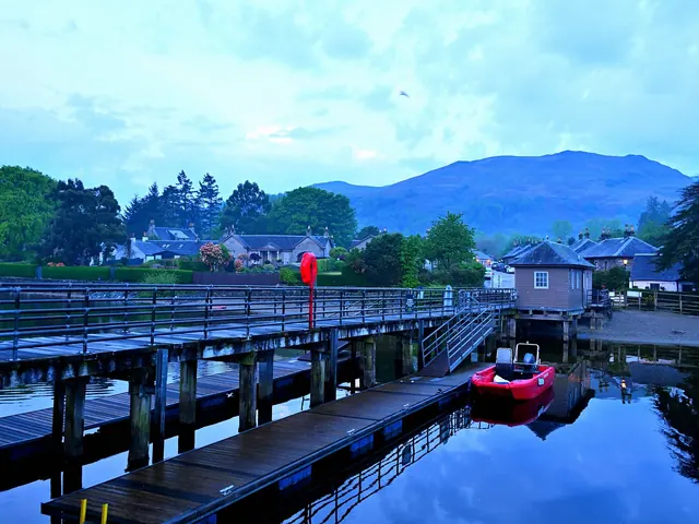 Luss pier with Loch Lomond and the hills behind