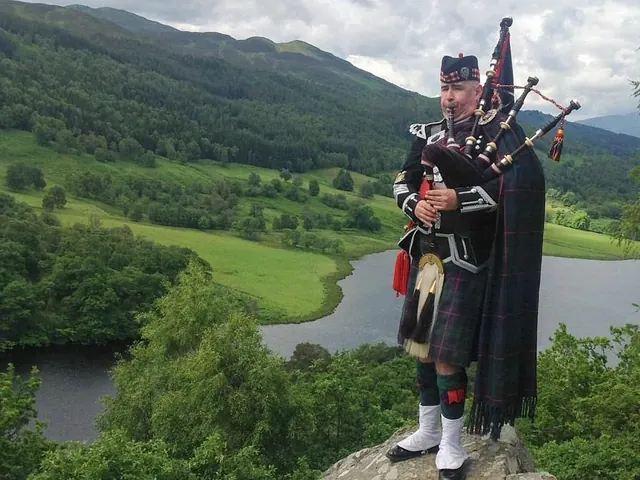 A piper at Queen’s View above Loch Tummel